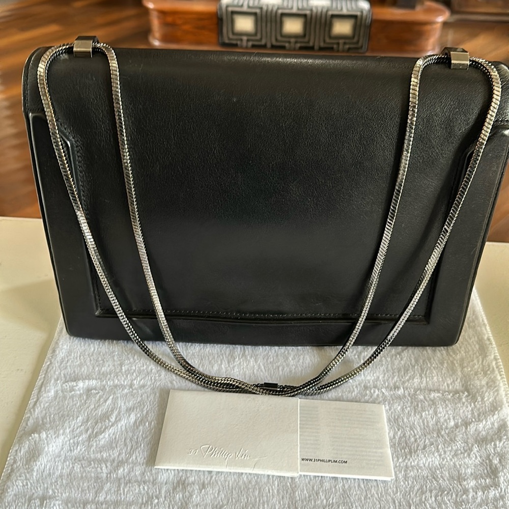 PHILLIP LIM Soleil East West flap shoulder bag. Black 12Lx 3.5W x 8H inches.